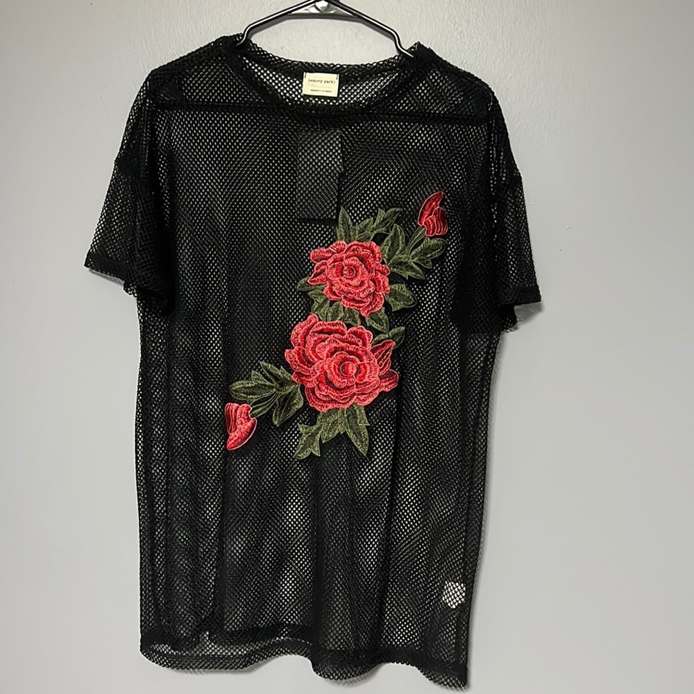 brand new, never worn. could be a dress or over sized top. see through